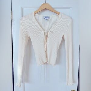 The cutest 100% cotton top! It's super soft and comfy, perfect for summer days.